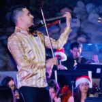 Josué Rugama M. hace solo de violín navideño acompañado por orquesta sinfónica