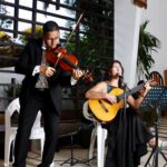 violinista y cantante guitarrista en boda católica